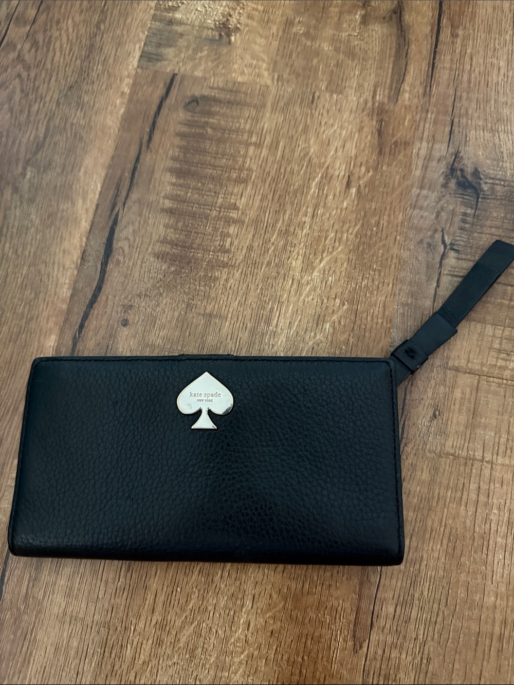 kate spade Black Leather Zip wallet with Gold Spade Emblem